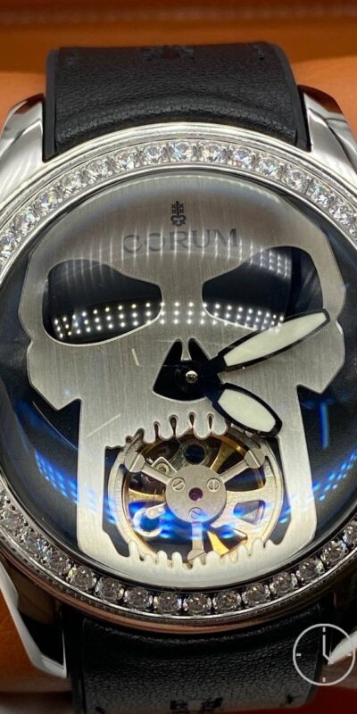 часы CORUM SCULL