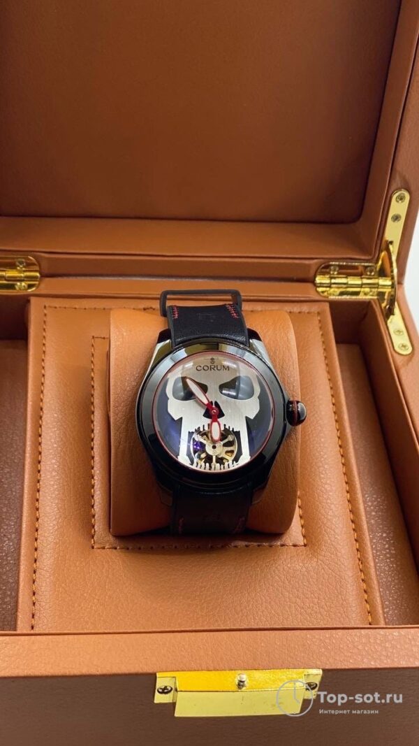 часы CORUM SCULL